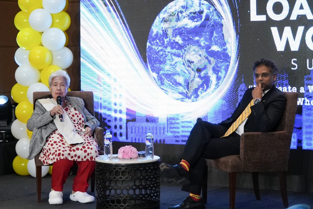 SEAMEO INNOTECH Center Director Prof. Leonor Magtolis Briones  with Dr. Sanjay Ramdath at the grand opening of the  Ladies of All Nations International (LOANI) World Summit 